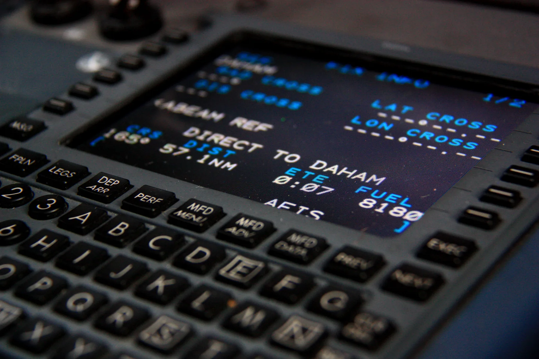 FMS avionics display in a business jet cockpit